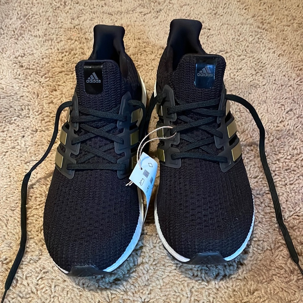 Men’s Size 10.5 Black and Gold Adidas ultra-boost